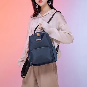 2021 nove ženske torbe za ženske torbe trend korejska različica čiste barve, enostavno in modno Oxford krpo dame nahrbtnik Bolsa